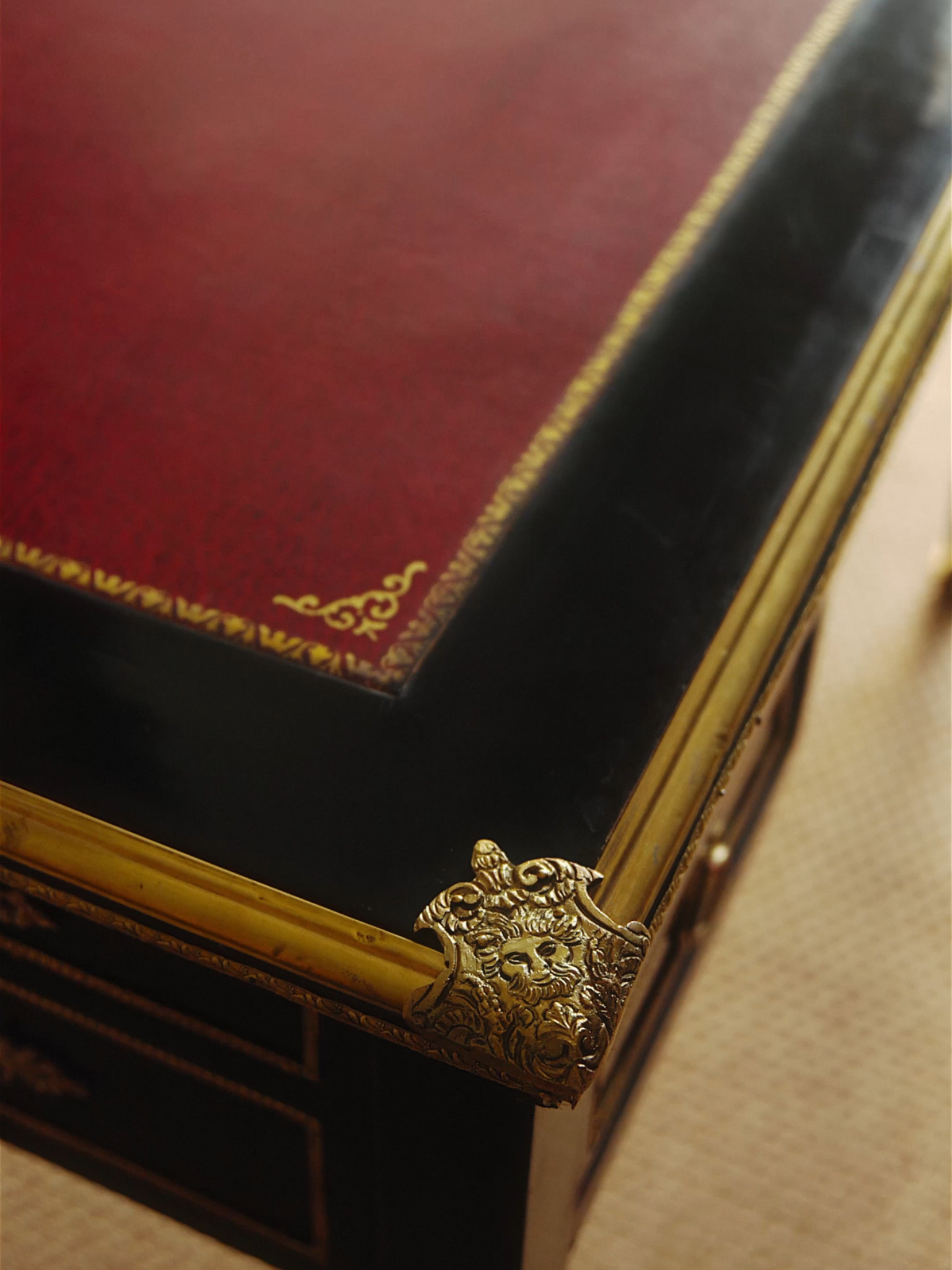 French Empire Revival Ebonized Bureau Plat with Gilt Bronze Mounts & Red Tooled Leather Top