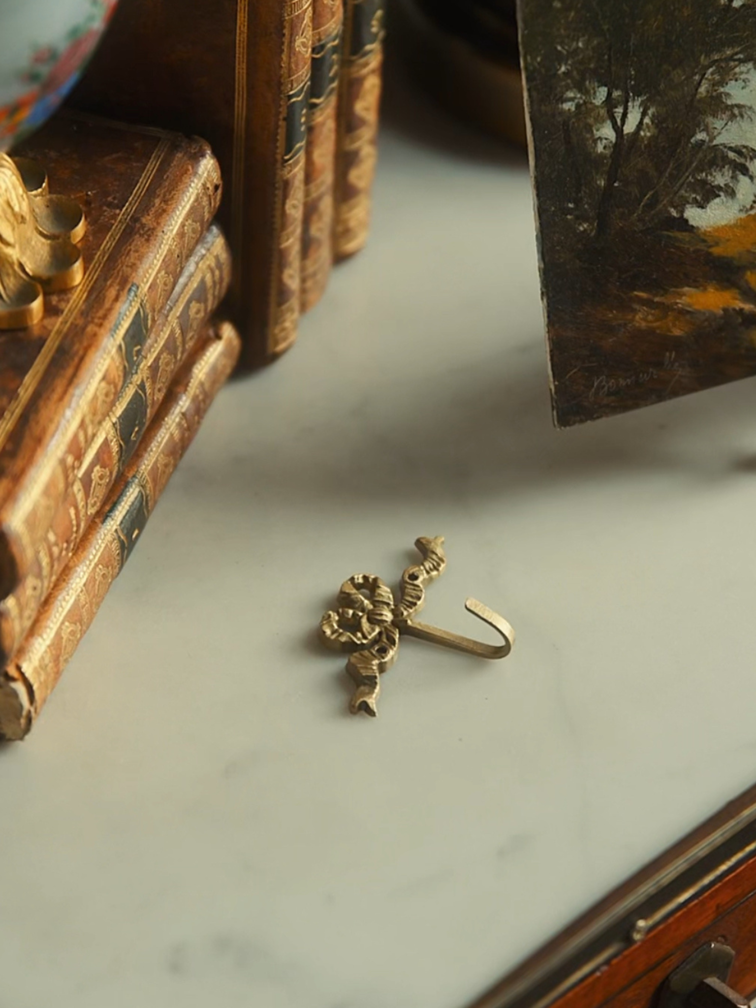 Miniature Brass Bow Key Hook