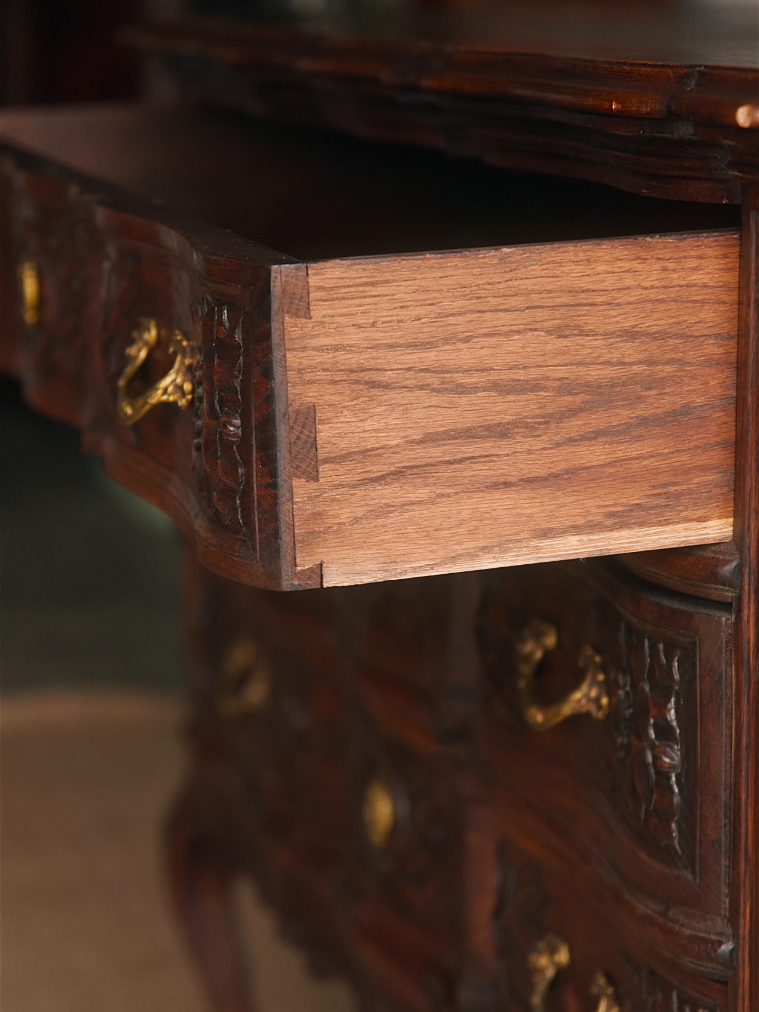 French Louis XV–Style Carved Oak Commode With Ormolu Mounts