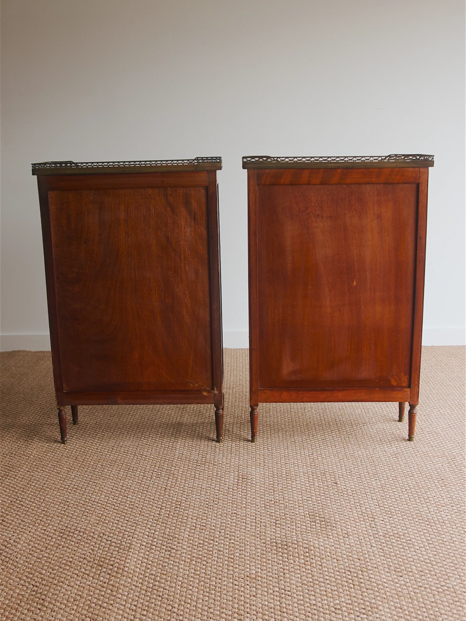 Pair of French Louis XVI–Style Mahogany Pier Cabinets With Marble Tops & Brass Galleried Rims