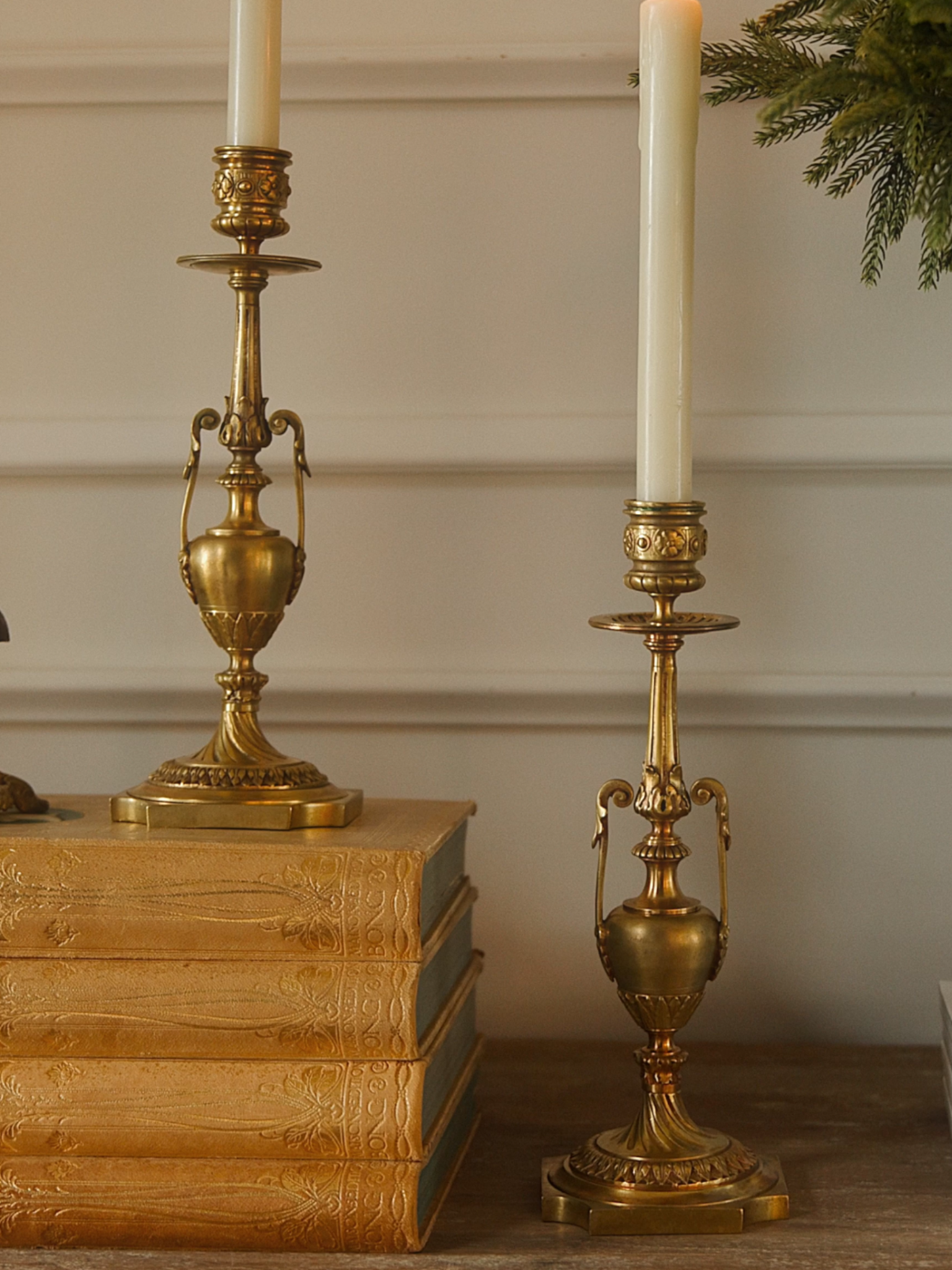 Pair of French Neoclassical Brass Urn Candlesticks