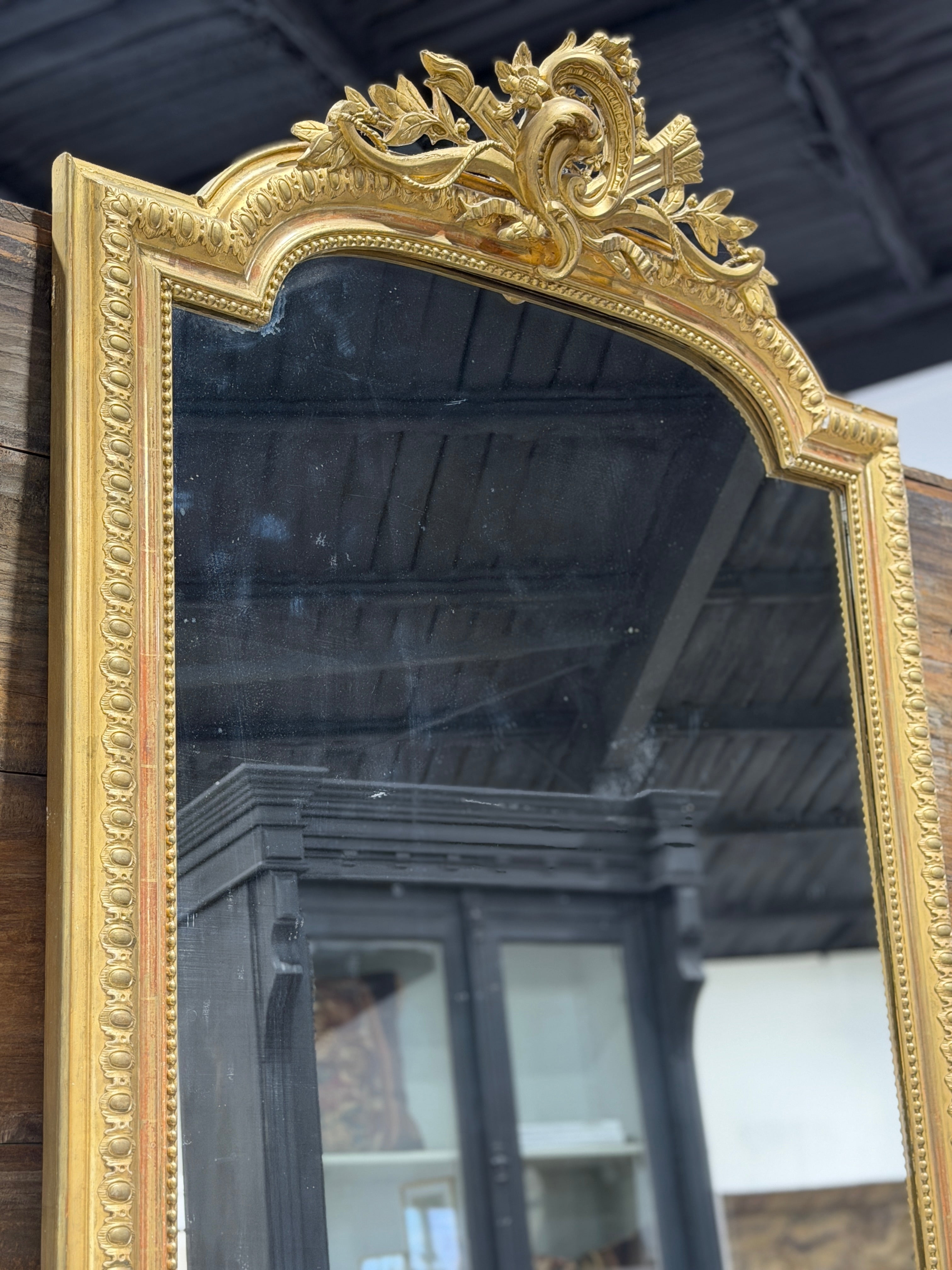 Monumental French Louis XVI Style Giltwood Mirror with Ribbon Crest
