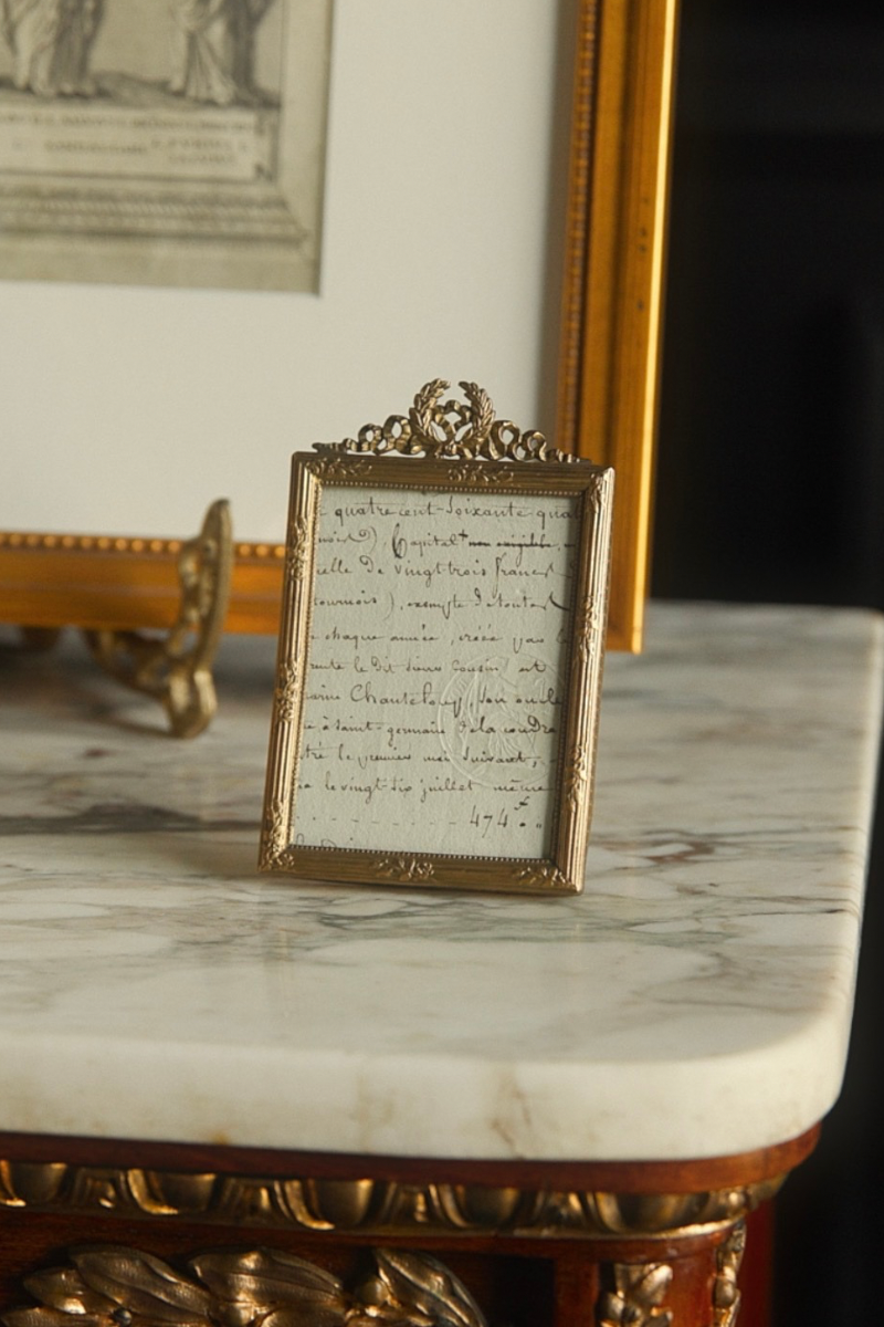 Small Mid-20th Century French Ornate Brass Picture Frame with Ribbon Crest Detail