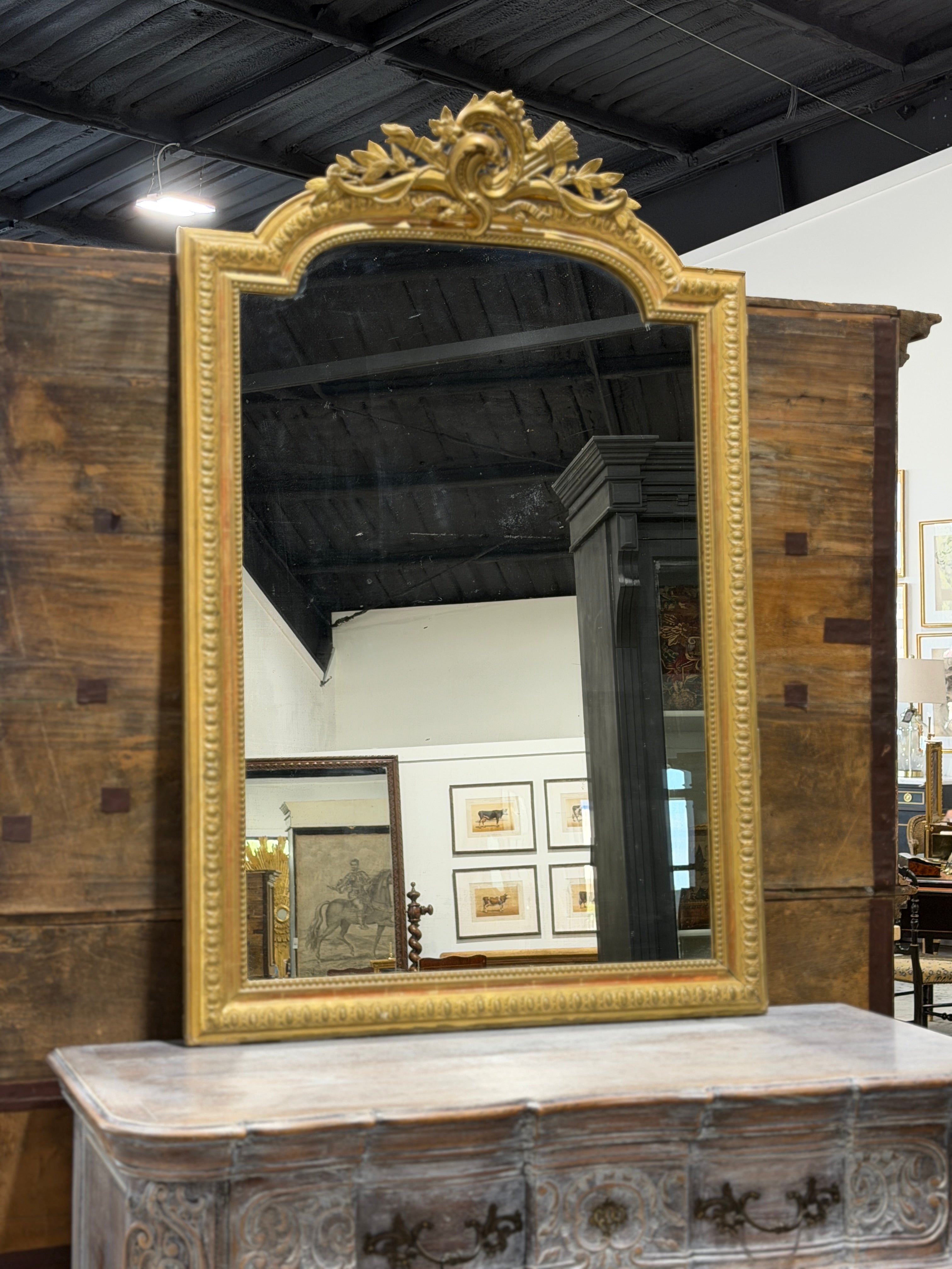 Monumental French Louis XVI Style Giltwood Mirror with Ribbon Crest