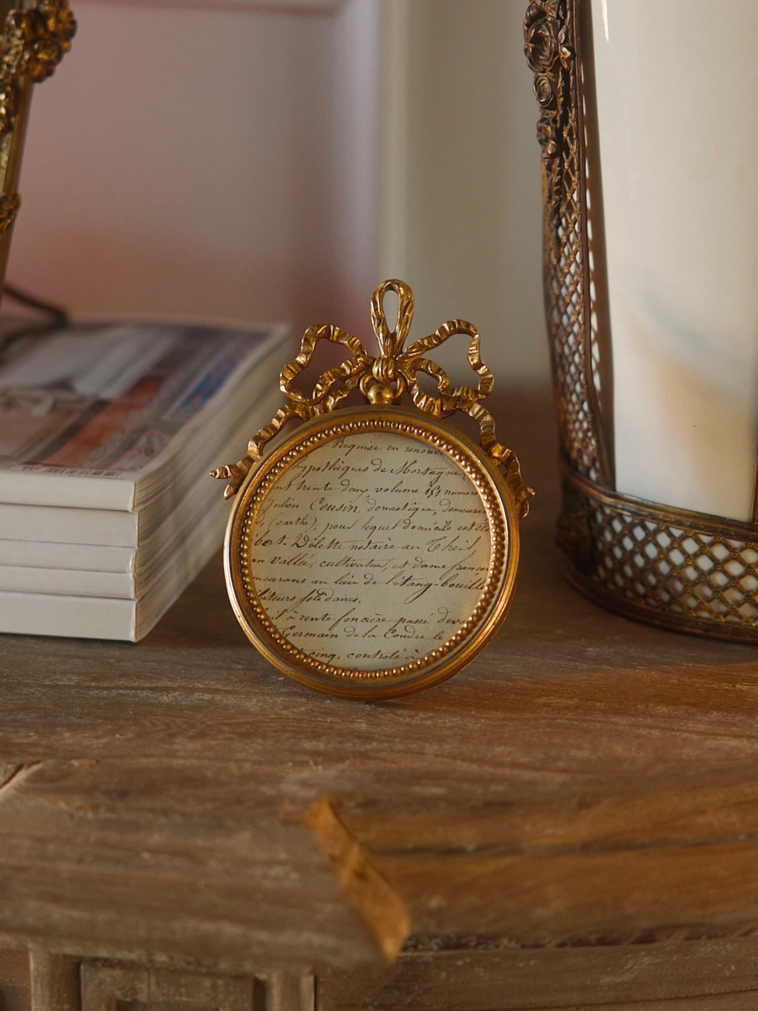 Antique French Gilt Bronze Oval Frame with Large Bow Detailing