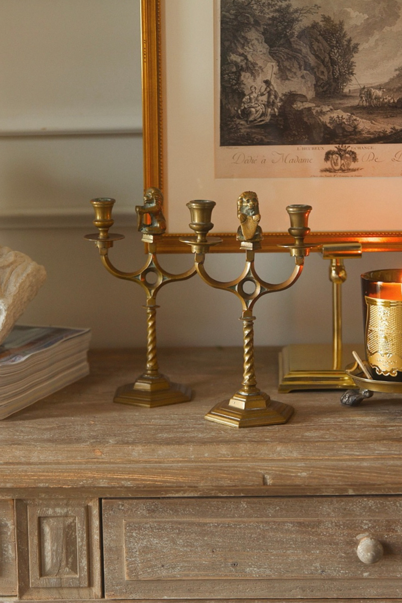 Pair of 19th Century French Figural Brass Candelabras with Shield