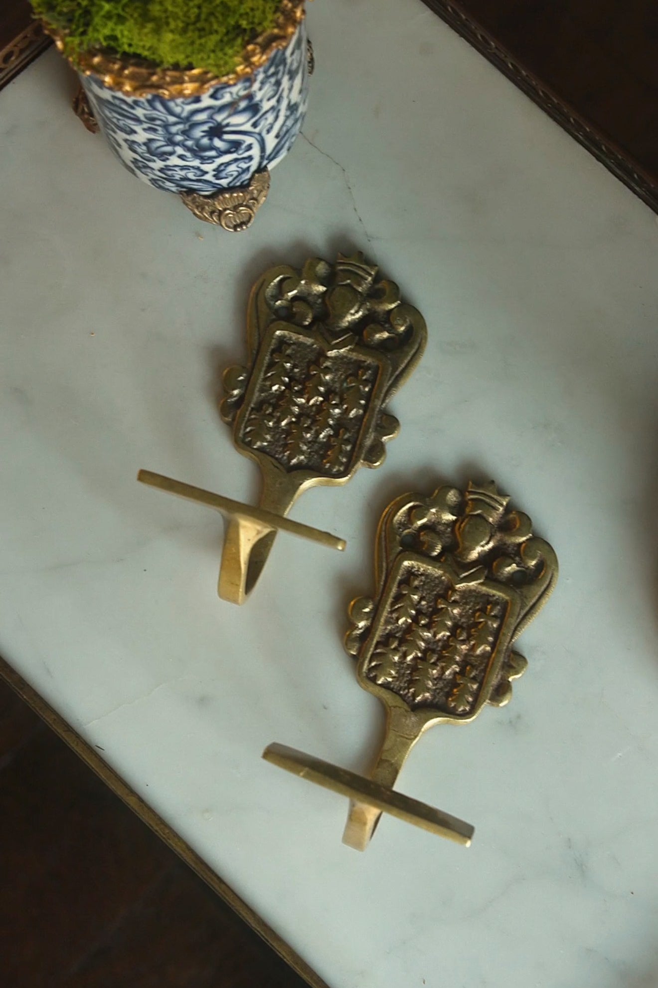 Pair of Antique French Brass Crest Wall Hooks