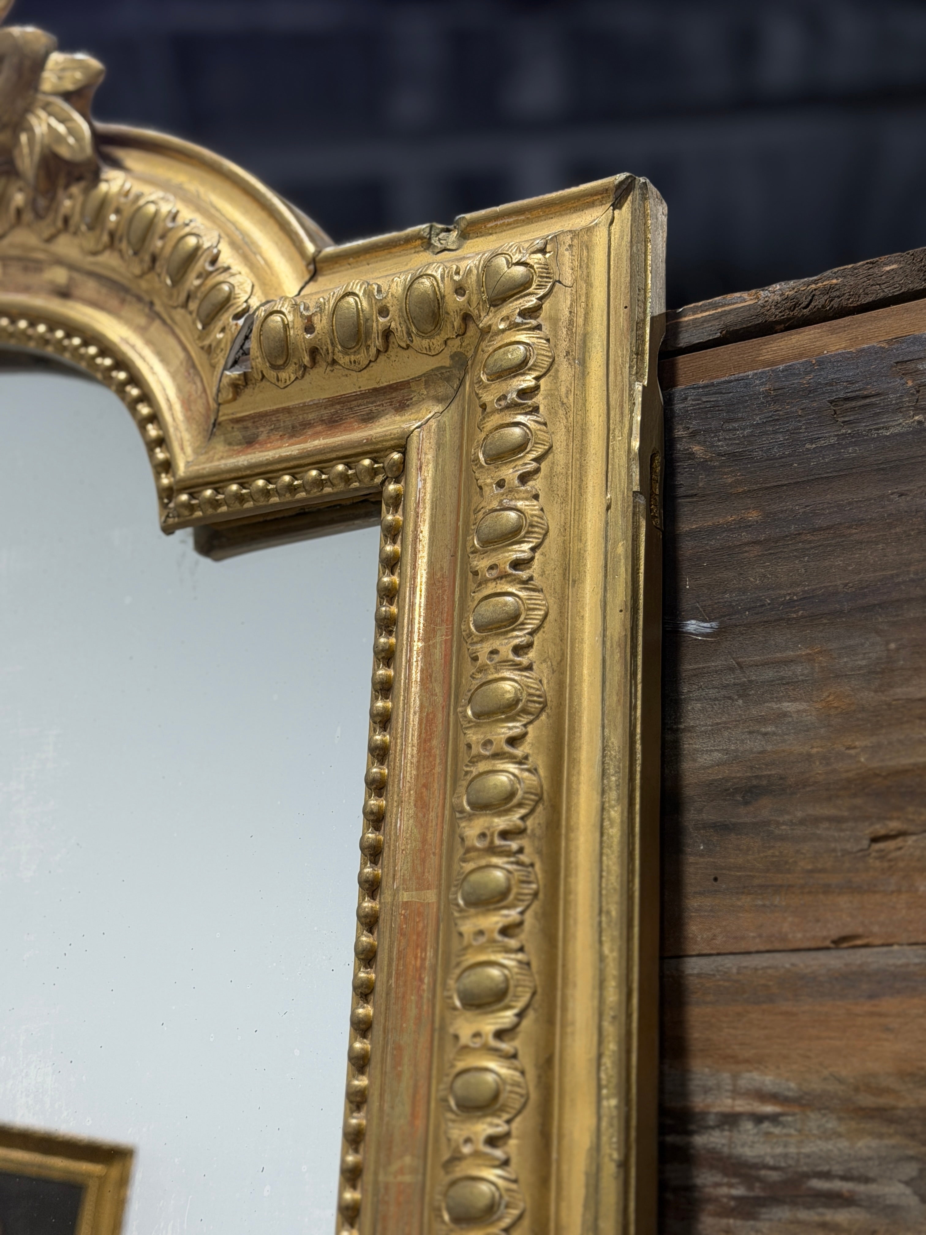 Monumental French Louis XVI Style Giltwood Mirror with Ribbon Crest