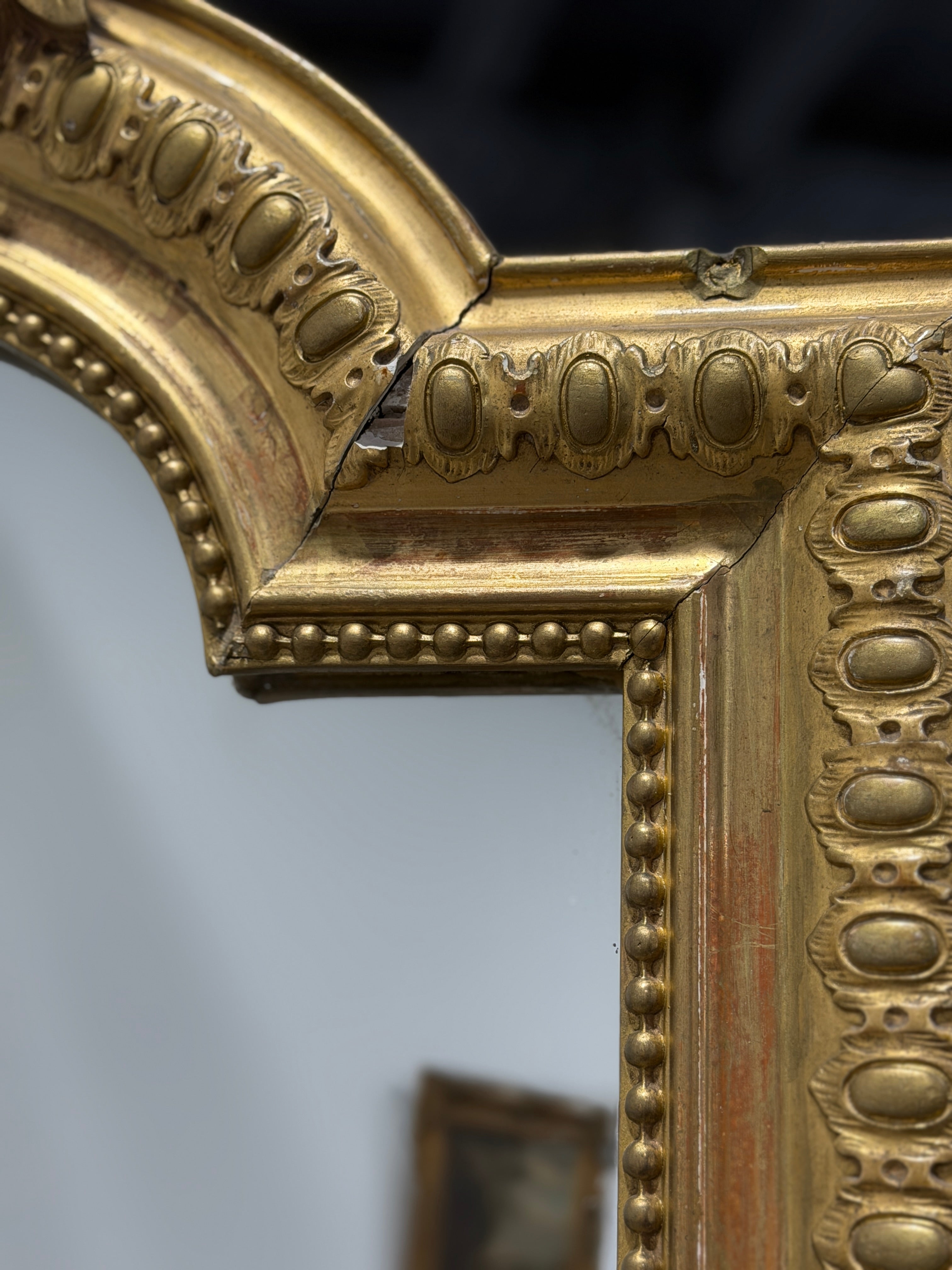 Monumental French Louis XVI Style Giltwood Mirror with Ribbon Crest