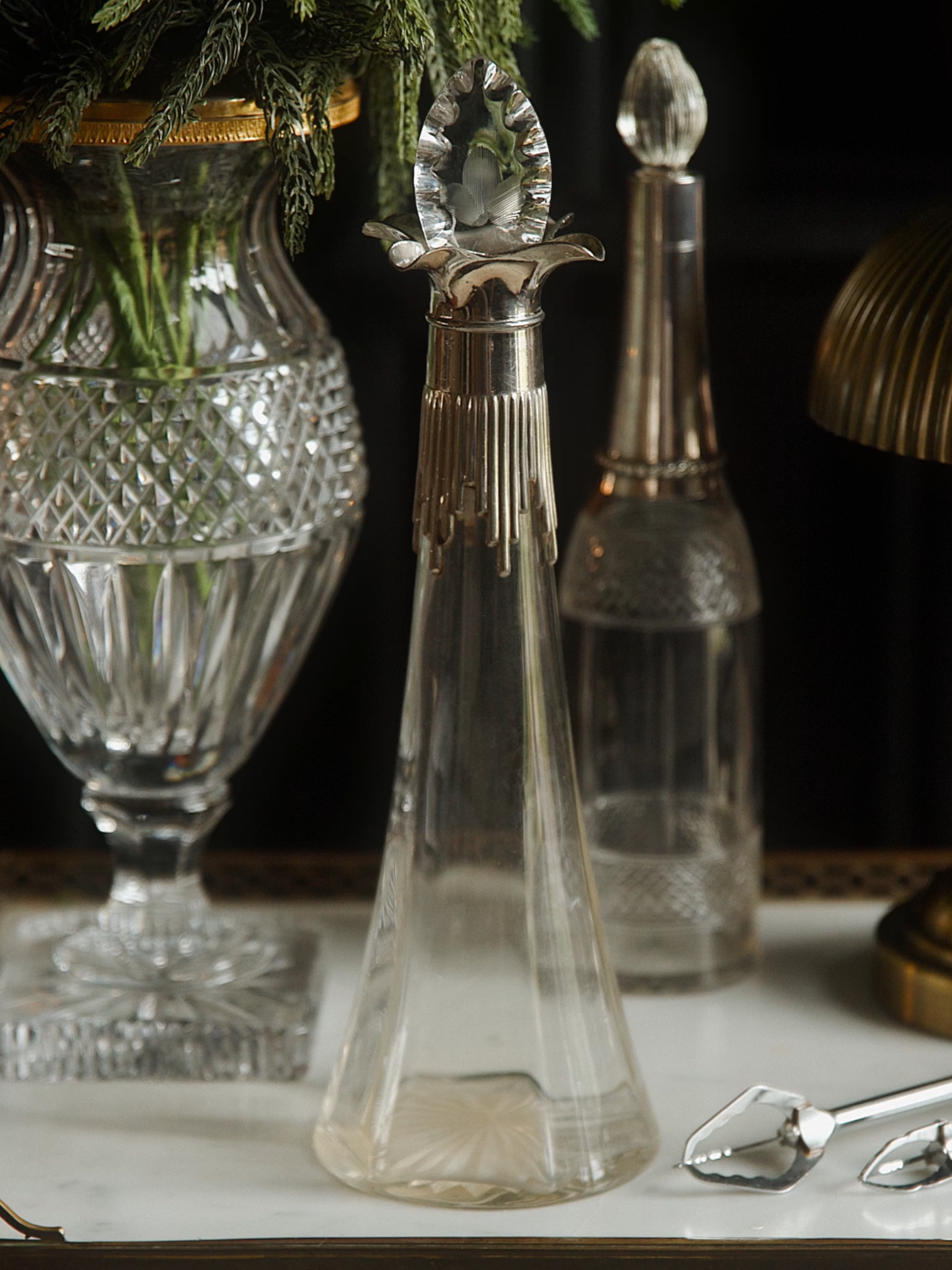 Elegant Tapered Glass Decanter with Ornate Silver Collar