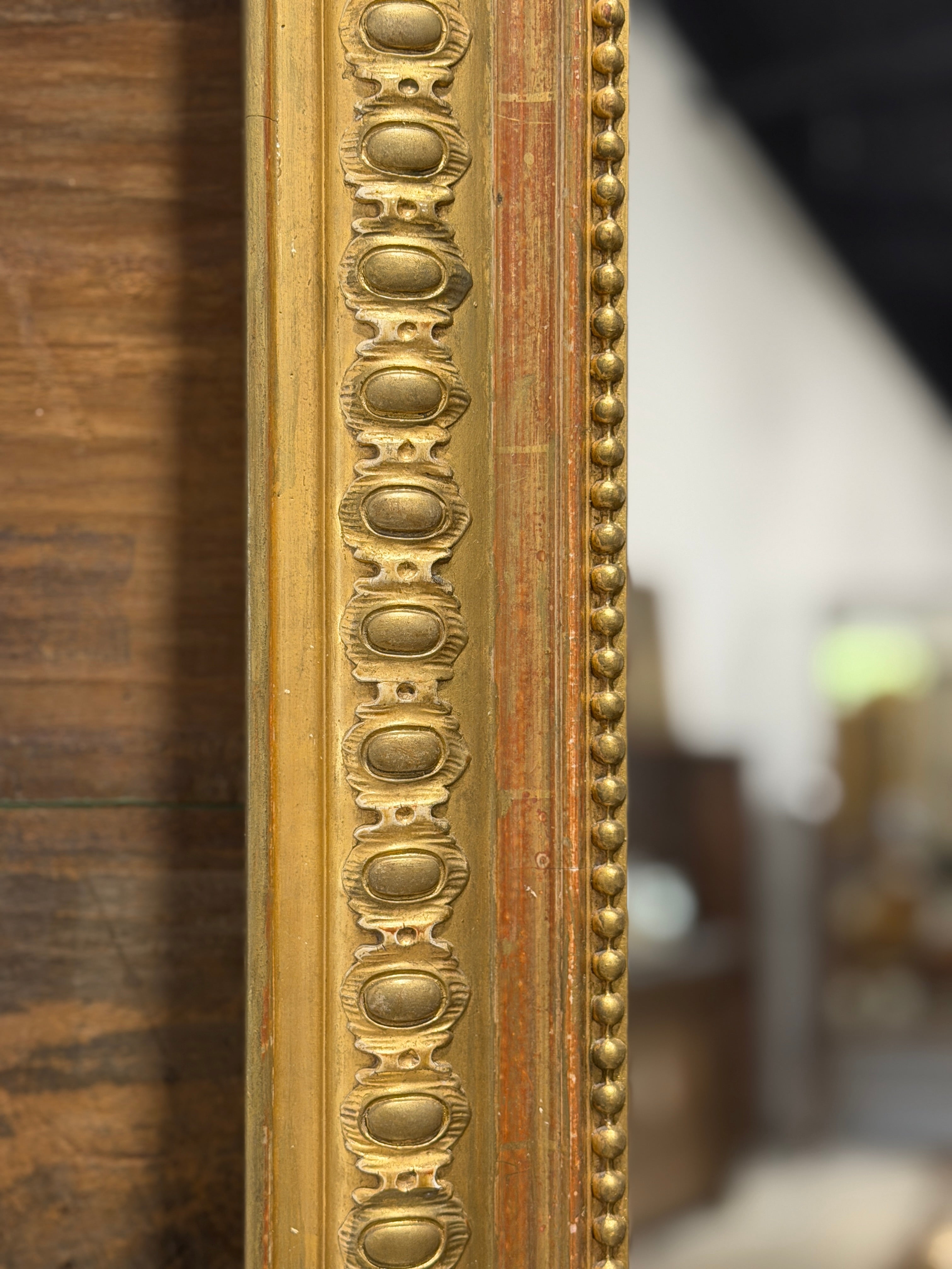 Monumental French Louis XVI Style Giltwood Mirror with Ribbon Crest