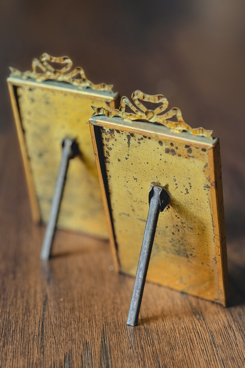 Pair of French Louis XVI Style Ribbon-Topped Brass Frames